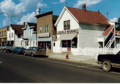 A photo of old businesses in a row